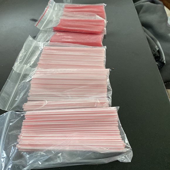 6 Bags of stirrers some red and white, and red. must be at least 100 in … - Picture 2 of 4